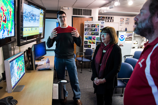 Jordan Gerth describing satellite imagery during SSEC tour.